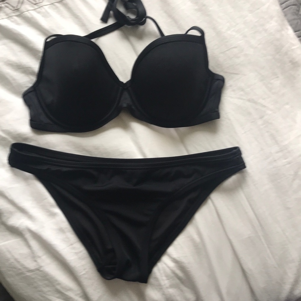 Victoria’s Secret bikini. Top 32DD bottom small.